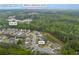 Dacula, GA aerial view of home near Mulberry Elementary School and Baily Rd surrounded by lush trees at 3510 Meadow Grass Dr, Dacula, GA 30019