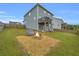 Expansive backyard with a fire pit area, ideal for outdoor gatherings and relaxation at 3510 Meadow Grass Dr, Dacula, GA 30019