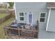 Cozy outdoor deck with furniture, perfect for relaxing and entertaining guests at 3510 Meadow Grass Dr, Dacula, GA 30019