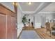 Inviting foyer with hardwood floors, neutral paint, and elegant trim, leading into an open floor plan at 3510 Meadow Grass Dr, Dacula, GA 30019