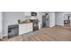 Kitchen featuring white cabinets, stainless steel appliances, and hard surface flooring at 3510 Meadow Grass Dr, Dacula, GA 30019