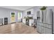 Kitchen featuring white cabinetry and stainless steel appliances, and a rear door at 3510 Meadow Grass Dr, Dacula, GA 30019