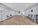 Expansive living room featuring a hardwood floor and neutral wall color at 3510 Meadow Grass Dr, Dacula, GA 30019