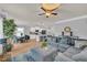 Spacious living area that combines seating and dining with adjacent kitchen at 3510 Meadow Grass Dr, Dacula, GA 30019