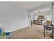 Spacious main bedroom suite features a sitting area, tray ceiling, and plush carpeting at 3510 Meadow Grass Dr, Dacula, GA 30019