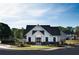 Charming community clubhouse featuring a manicured lawn and stylish architectural details at 5106 Arista Dr, Douglasville, GA 30135