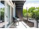 Cozy balcony view with black metal railings and outdoor seating overlooking lush greenery at 120 Alden Nw Ave # D2, Atlanta, GA 30309