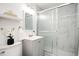 Clean bathroom featuring glass shower, vanity with storage, and modern fixtures at 120 Alden Nw Ave # D2, Atlanta, GA 30309