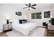 Stylish bedroom with large bed, modern decor, ceiling fan, and ample natural light at 120 Alden Nw Ave # D2, Atlanta, GA 30309