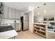 Modern kitchen with stainless steel appliances open to living area at 120 Alden Nw Ave # D2, Atlanta, GA 30309