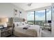 Bright bedroom with skyline view, modern decor, and comfortable space at 3344 Peachtree Ne Rd # 3601, Atlanta, GA 30326
