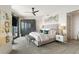 Elegant bedroom featuring a tufted headboard bed, balcony access, and decorative art at 3344 Peachtree Ne Rd # 3601, Atlanta, GA 30326