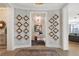 Inviting foyer featuring custom wall decor, hardwood floors, and an open view to the living area at 3344 Peachtree Ne Rd # 3601, Atlanta, GA 30326