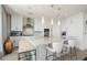Well-appointed kitchen featuring a large island with seating, pendant lighting, and stainless steel appliances at 3344 Peachtree Ne Rd # 3601, Atlanta, GA 30326