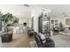 Inviting living area adjacent to kitchen, featuring chic decor, comfortable seating, and a bright, open layout at 3344 Peachtree Ne Rd # 3601, Atlanta, GA 30326