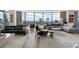 Spacious living room with floor-to-ceiling windows offering panoramic views, stylish seating, and contemporary decor at 3344 Peachtree Ne Rd # 3601, Atlanta, GA 30326