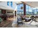 Bright and airy living room with floor-to-ceiling windows, modern decor, and scenic city and water views at 3344 Peachtree Ne Rd # 3601, Atlanta, GA 30326