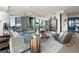 Comfortable living room with city views, stylish furnishings, and an open layout for entertaining at 3344 Peachtree Ne Rd # 3601, Atlanta, GA 30326
