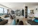 Open-concept living area with hardwood floors, city skyline views, and seamless flow to the kitchen at 3344 Peachtree Ne Rd # 3601, Atlanta, GA 30326