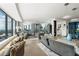 Expansive living room with floor-to-ceiling windows offering breathtaking city views and stylish furnishings at 3344 Peachtree Ne Rd # 3601, Atlanta, GA 30326