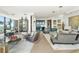 Spacious living room with floor-to-ceiling windows and modern decor showcasing city views at 3344 Peachtree Ne Rd # 3601, Atlanta, GA 30326