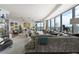 Expansive living room with panoramic city views, comfortable seating, and stylish decor at 3344 Peachtree Ne Rd # 3601, Atlanta, GA 30326