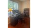 Office space with dual monitors, desk, and dark wood floors at 487 Cypher Dr, Suwanee, GA 30024