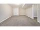 Unfinished basement with neutral paint, carpet and access to other areas of the home at 535 Transit Cir, Atlanta, GA 30349