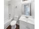 Bathroom with a tub, a toilet and sink at 1950 Matthew Way, Lithonia, GA 30058
