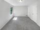 Bright bedroom with neutral carpet, window, and closet at 1950 Matthew Way, Lithonia, GA 30058