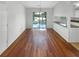 Dining area features hardwood floors and sliding glass doors to the backyard patio at 1950 Matthew Way, Lithonia, GA 30058