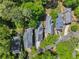 Aerial view of a neighborhood with mature trees, showcasing the community and home placement at 2244 Spink Nw St, Atlanta, GA 30318