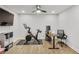 Finished basement perfect for an exercise room, complete with an exercise bike, desk, and TV at 2244 Spink Nw St, Atlanta, GA 30318