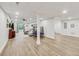 Spacious finished basement offering a large living area and flexible open layout with new laminate flooring at 2244 Spink Nw St, Atlanta, GA 30318