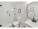 Modern bathroom features a glass enclosed shower, contemporary fixtures, and stylish decor at 2244 Spink Nw St, Atlanta, GA 30318