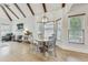 Bright dining area with a bay window, chandelier, and hardwood floors at 2244 Spink Nw St, Atlanta, GA 30318