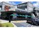 Ted's Montana Grill offers outdoor dining with umbrella covered tables, and convenient parking at 2244 Spink Nw St, Atlanta, GA 30318