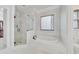 Luxurious main bathroom with a separate tub and shower at 2244 Spink Nw St, Atlanta, GA 30318