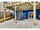Cozy backyard patio with seating and outdoor grill, ideal for relaxing and entertaining guests at 2244 Spink Nw St, Atlanta, GA 30318