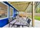 Outdoor patio featuring a large table, chairs, and a backyard view, perfect for dining at 2244 Spink Nw St, Atlanta, GA 30318