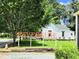Charming Riverside neighborhood, with a well-manicured lawn and a classic vintage home at 2244 Spink Nw St, Atlanta, GA 30318