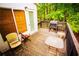 Outdoor deck perfect for relaxation, featuring seating and a grill at 6147 Pritchett Dr, Powder Springs, GA 30127