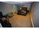 Basement features a futon, accent chair and area rug at 6147 Pritchett Dr, Powder Springs, GA 30127