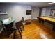 Basement with pool table, bar, and television at 6147 Pritchett Dr, Powder Springs, GA 30127