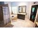 Bathroom featuring a walk in shower, soaker tub and vanity at 6147 Pritchett Dr, Powder Springs, GA 30127