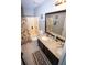 Stylish bathroom with granite countertops, tile flooring, and shower-tub combo at 6147 Pritchett Dr, Powder Springs, GA 30127