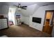 Bedroom with a neutral color palette, plush carpeting, and a ceiling fan at 6147 Pritchett Dr, Powder Springs, GA 30127