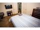 Bedroom with a comfortable bed, television, and doorway leading to another room at 6147 Pritchett Dr, Powder Springs, GA 30127