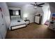 Cozy bedroom with carpet, ceiling fan, a large bed, and an abundance of natural light at 6147 Pritchett Dr, Powder Springs, GA 30127