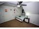 Comfortable bedroom with carpet, ceiling fan, and a large bed with an abundance of light at 6147 Pritchett Dr, Powder Springs, GA 30127